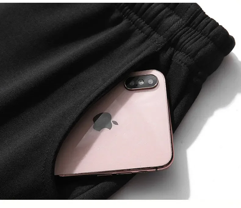 .A casual sports outfit consisting of a long-sleeved hooded t-shirt and elastic-waist pants. .A casual sports outfit consisting of a long-sleeved hooded t-shirt and elastic-waist pants.