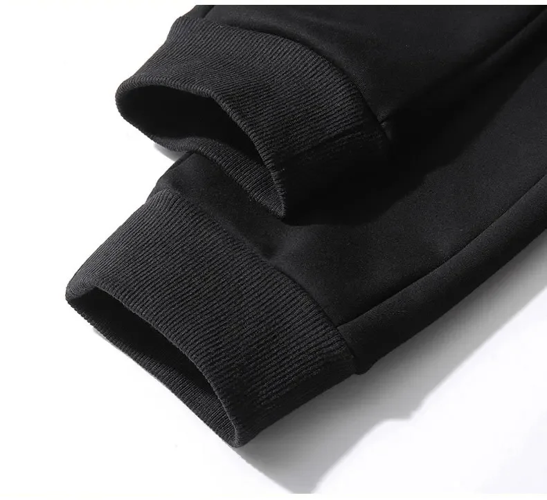 .A casual sports outfit consisting of a long-sleeved hooded t-shirt and elastic-waist pants. .A casual sports outfit consisting of a long-sleeved hooded t-shirt and elastic-waist pants.